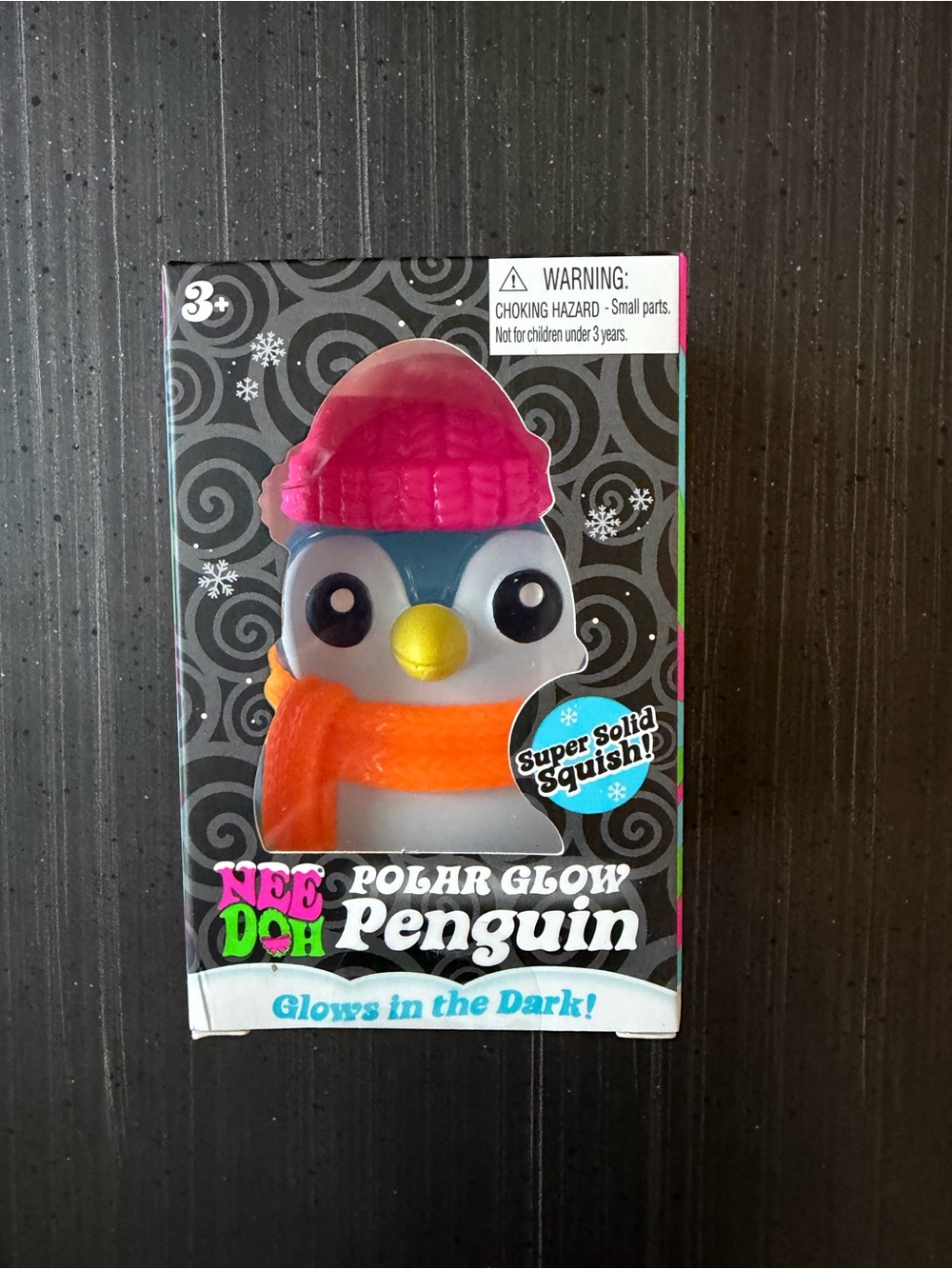 NeeDoh “Polar Glow Penguin” - Pink Hat & Orange Scarf